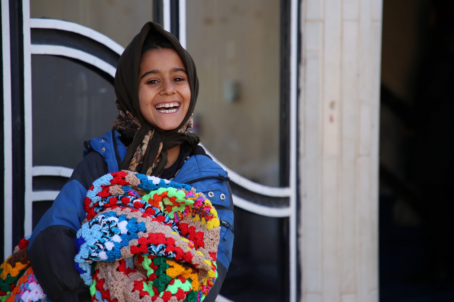 Ibrahim, 10, Surprised & Happy To Receive A Woolen Wrap