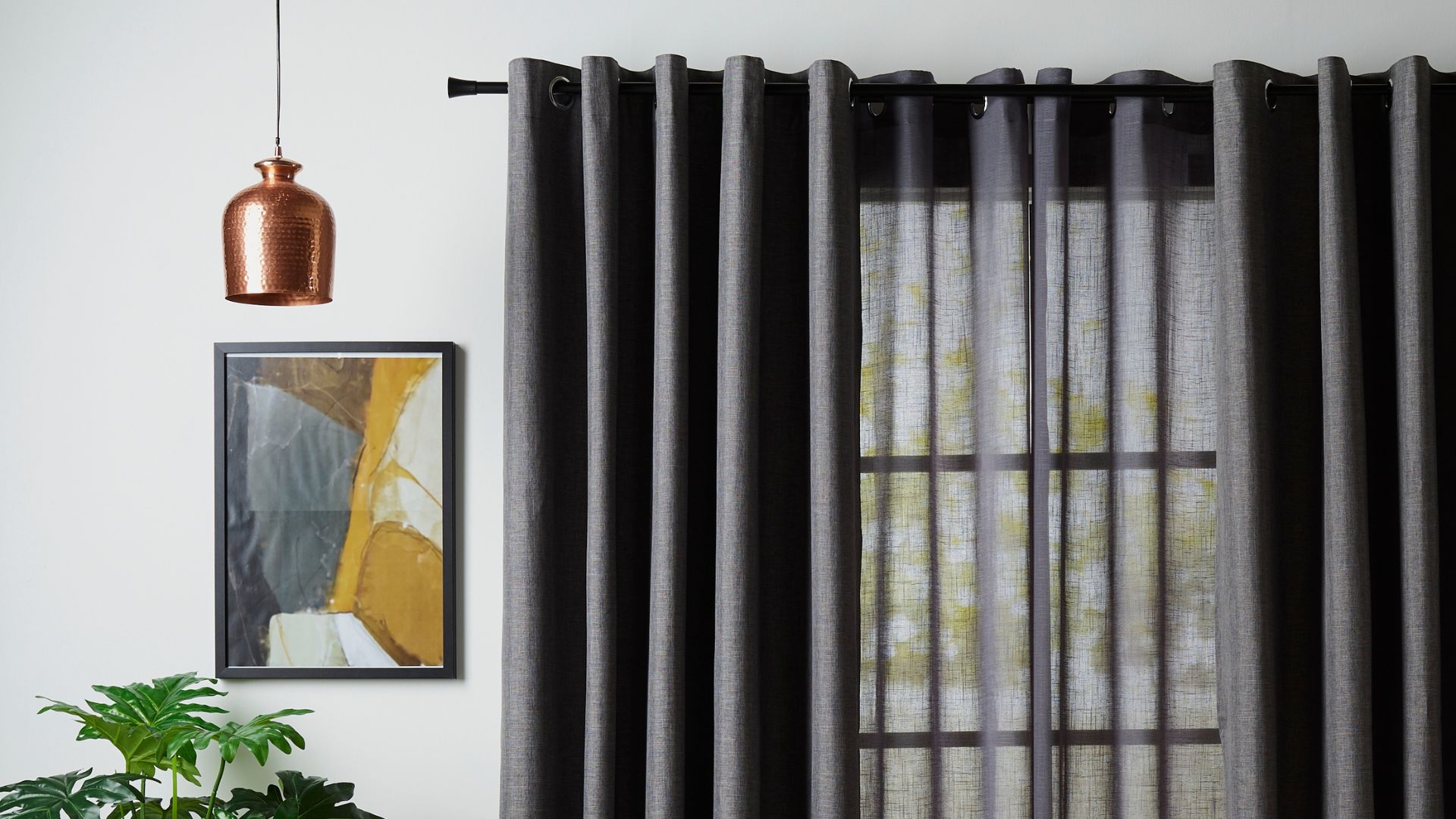 Sheer dark grey eyelet curtains