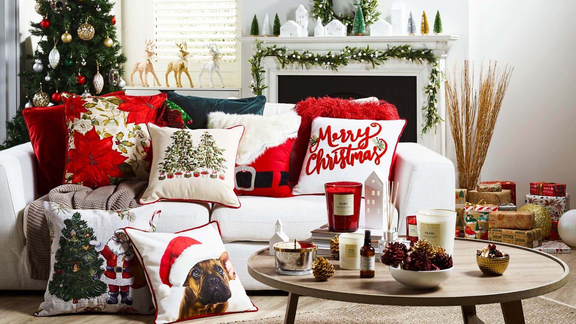 Assorted Christmas cushions in a decorated living room