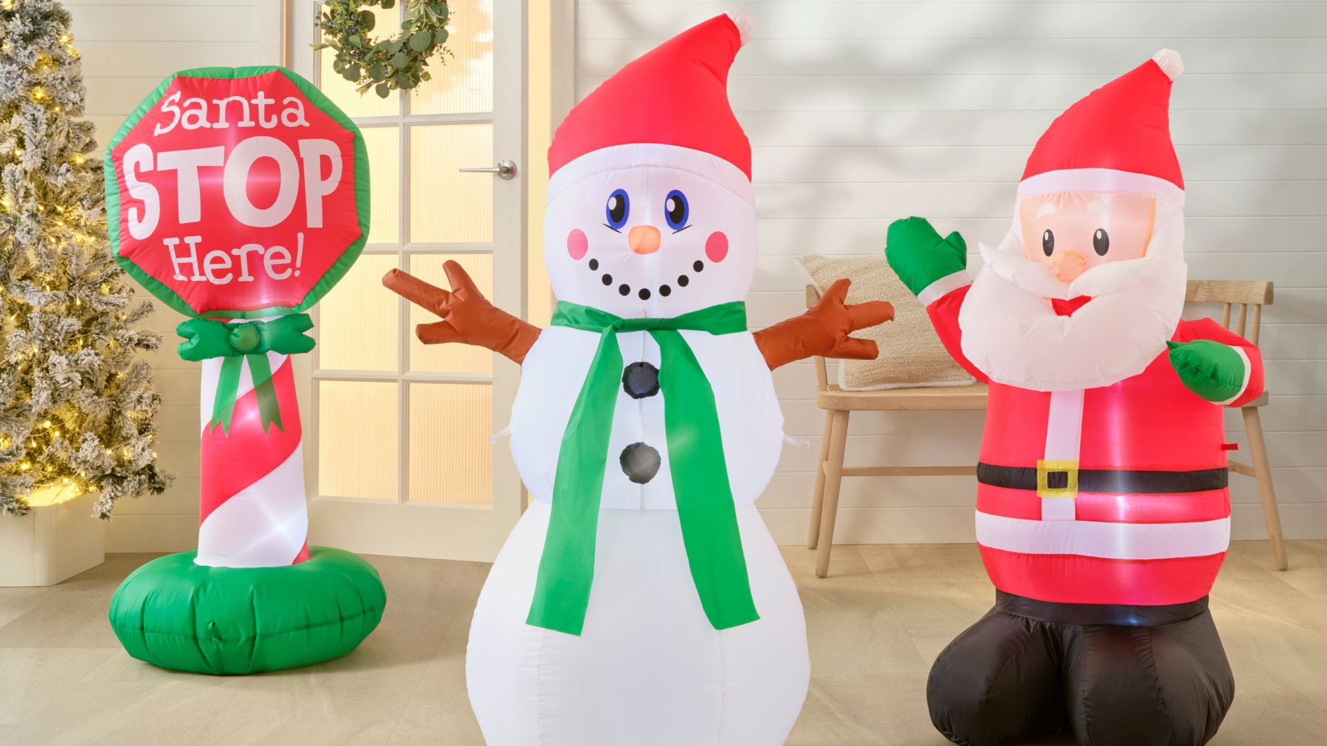 Santa, snow sign & snowman Christmas themed inflatables